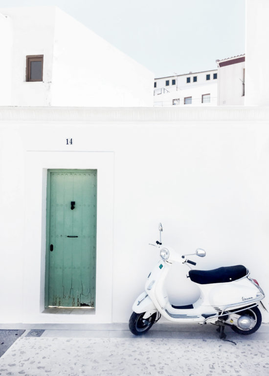 White-street-and-Vespa-in-Ibiza