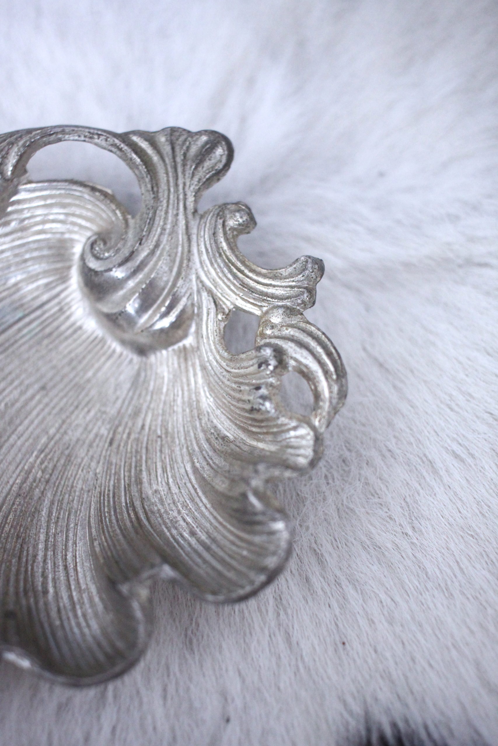 Silver antique shell ashtray closeup