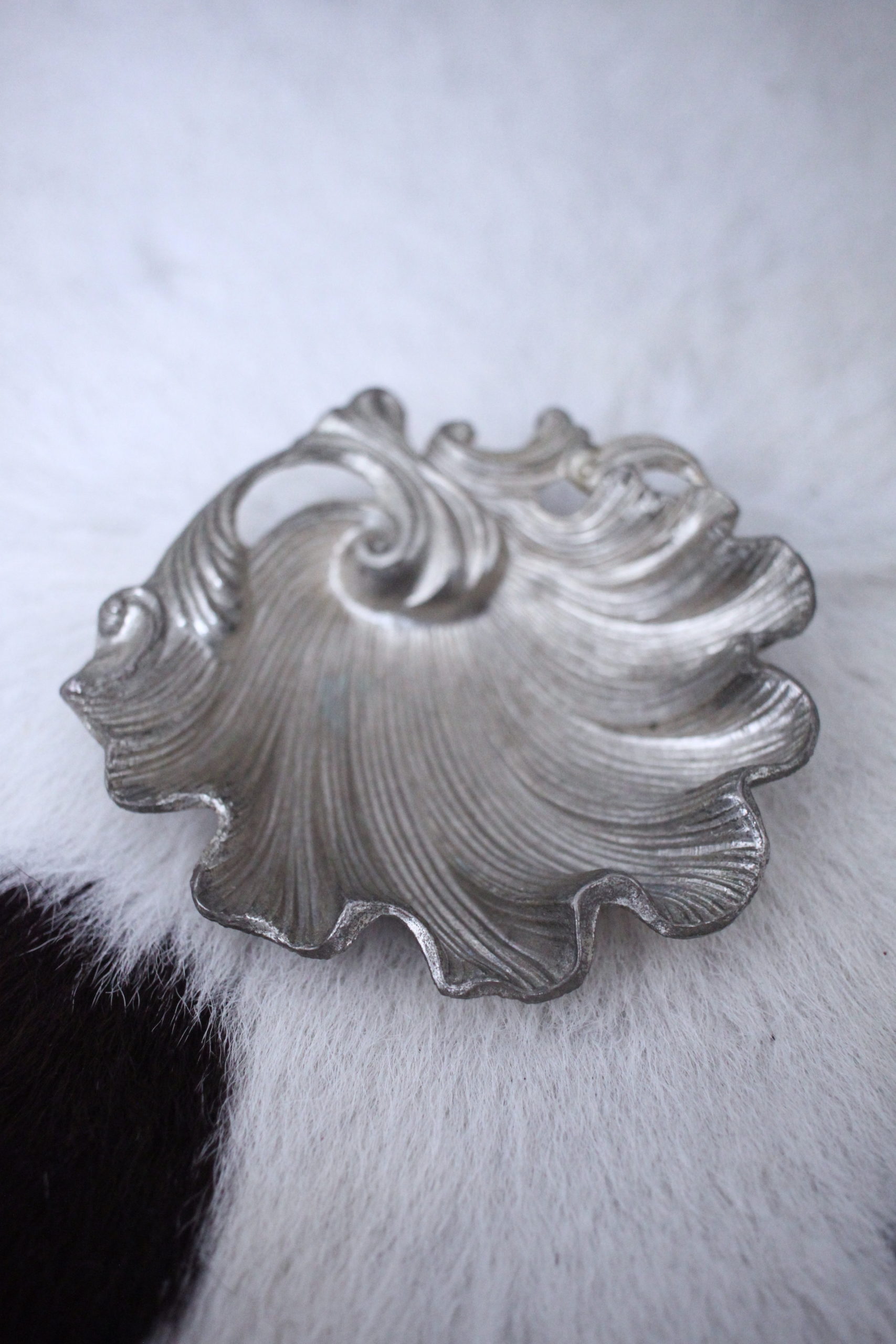 Silver antique shell ashtray flatlay