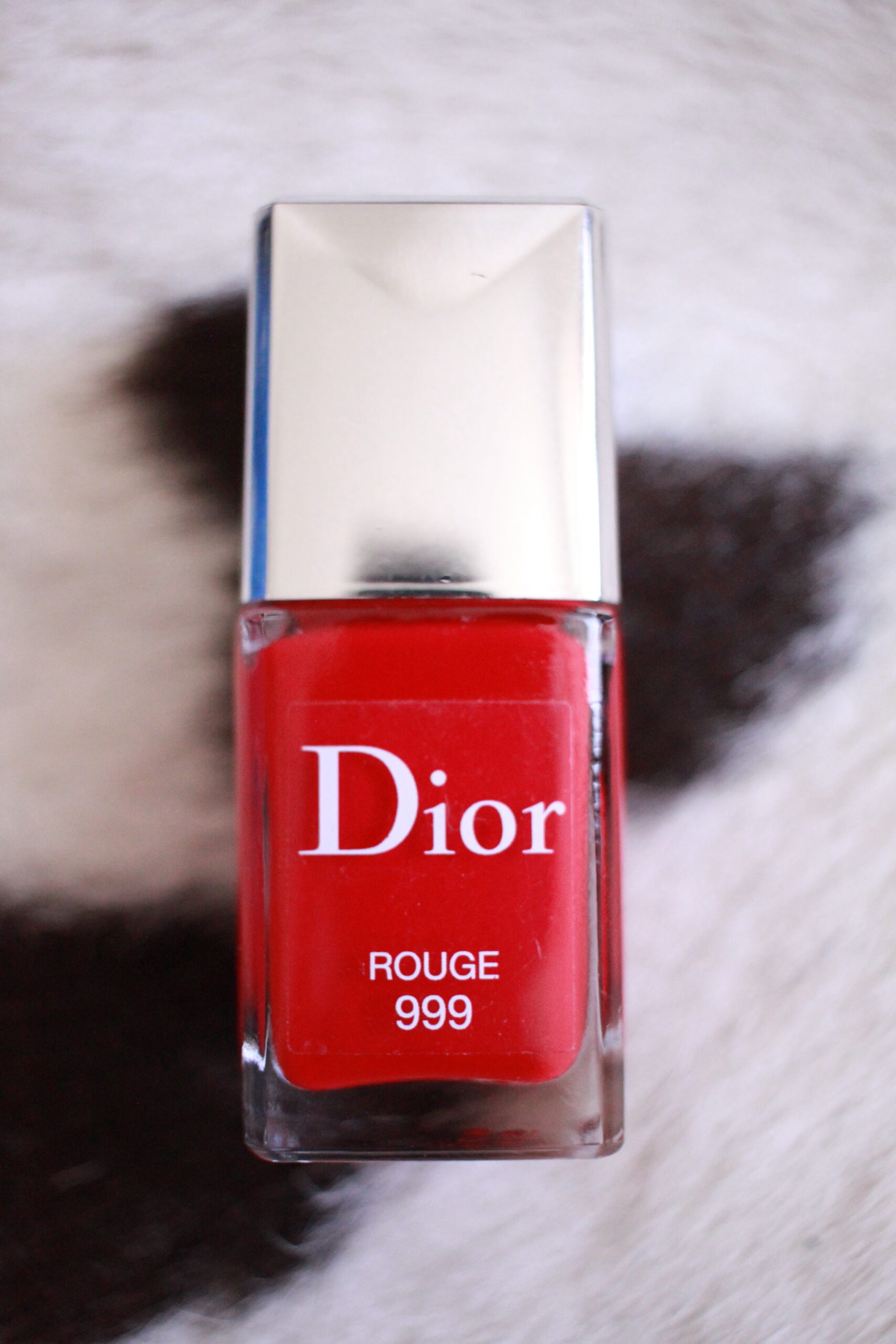 Dior red 999 nail polish closeup