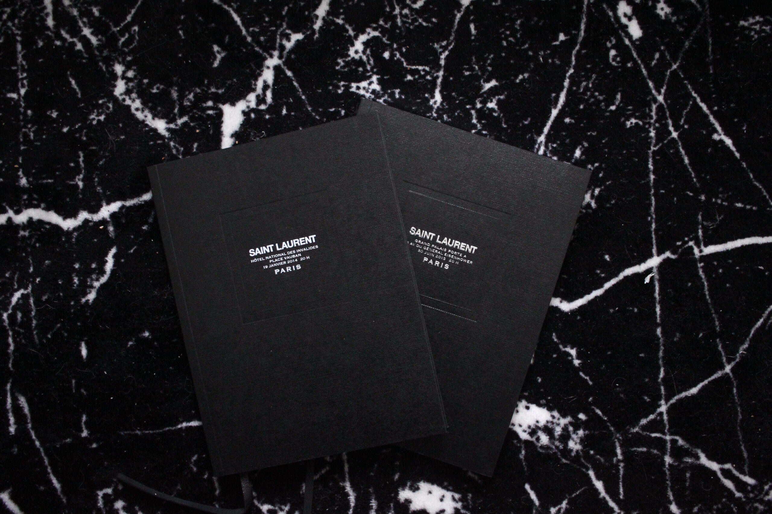 Saint Laurent books marble backdrop