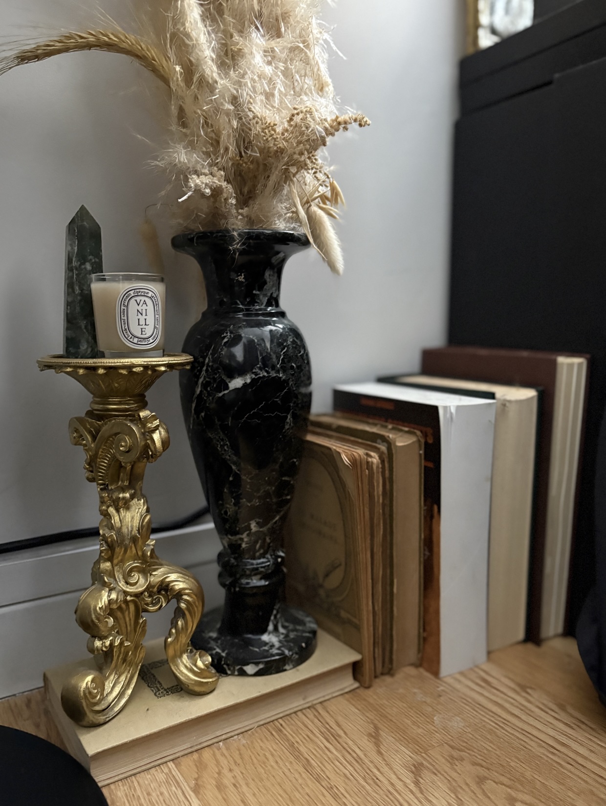 Books Marble vase Golden chandelier